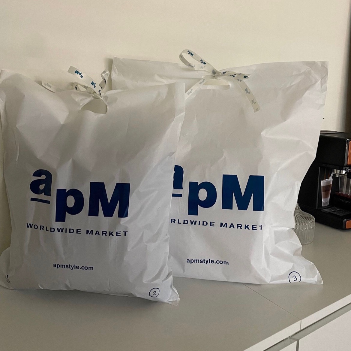 新款韩国东大门APM服装袋档口手拎塑料购物袋商场包装袋100个现货