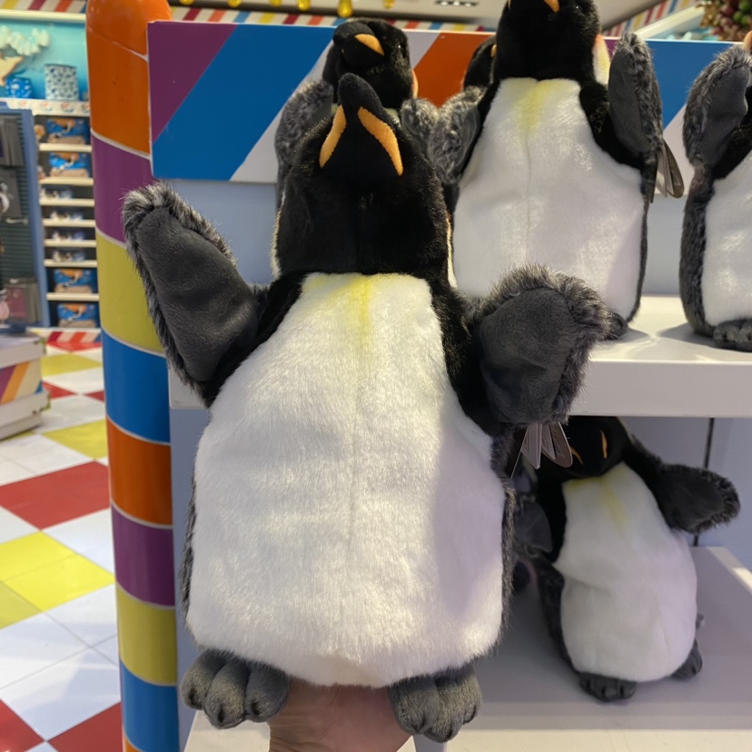 珠海长隆海洋王国纪念品可爱仿真站姿帝企鹅手偶毛绒儿童玩具礼物