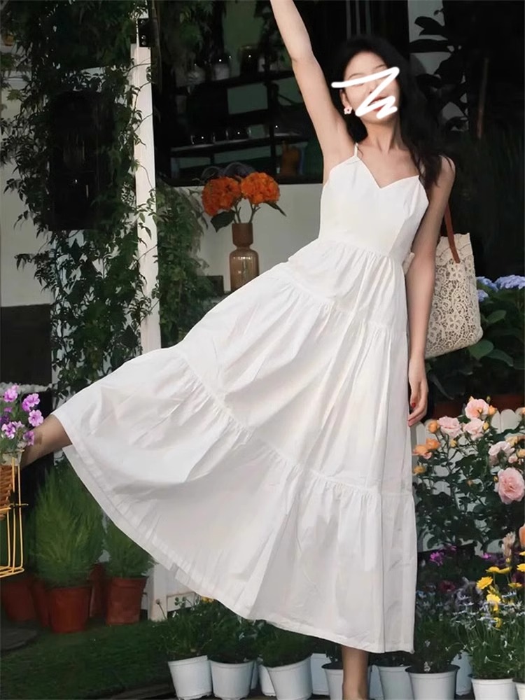 法式白色v领吊带连衣裙子女夏季2024新款收腰设计感小众气质长裙