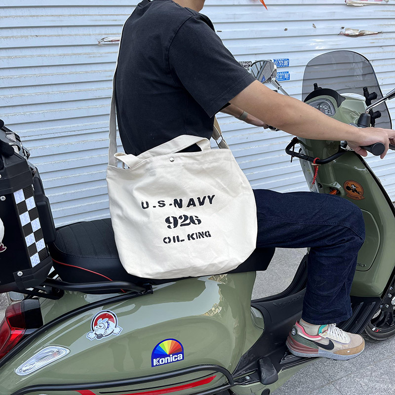 ins小众设计美式复古摩托机车帆布包男女生斜挎大容量22新款包包