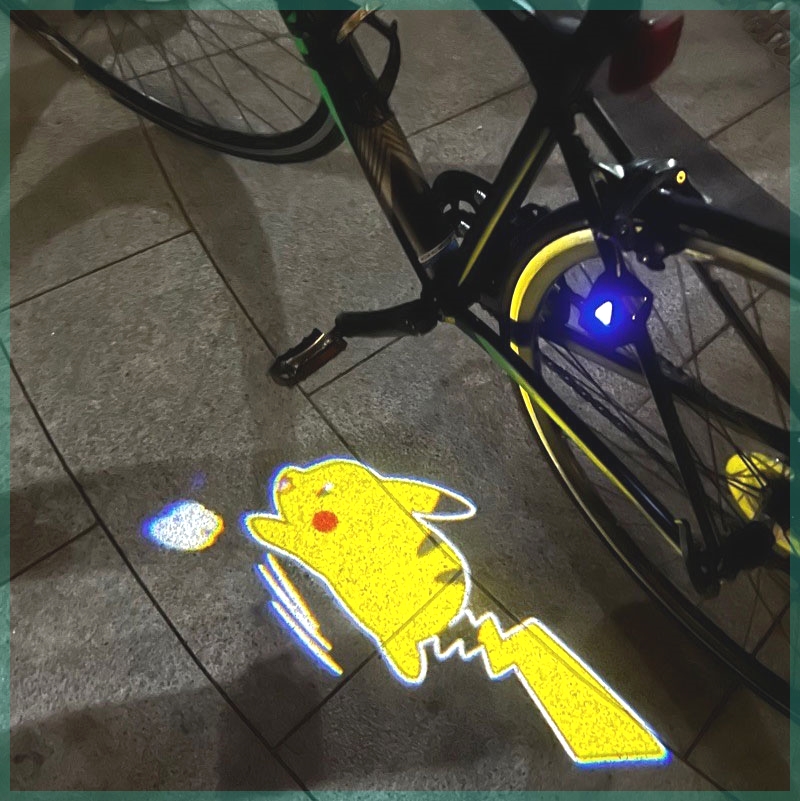 自行车摆件电动车投影灯单车装饰配件摩托车动态皮卡丘车载迎宾灯