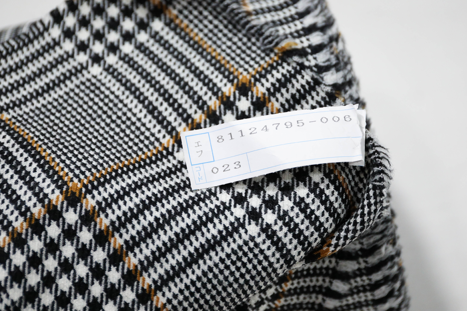 日本进口薄款黑白橘色细腻威尔士格纹编织粗纺纯羊毛设计师布料