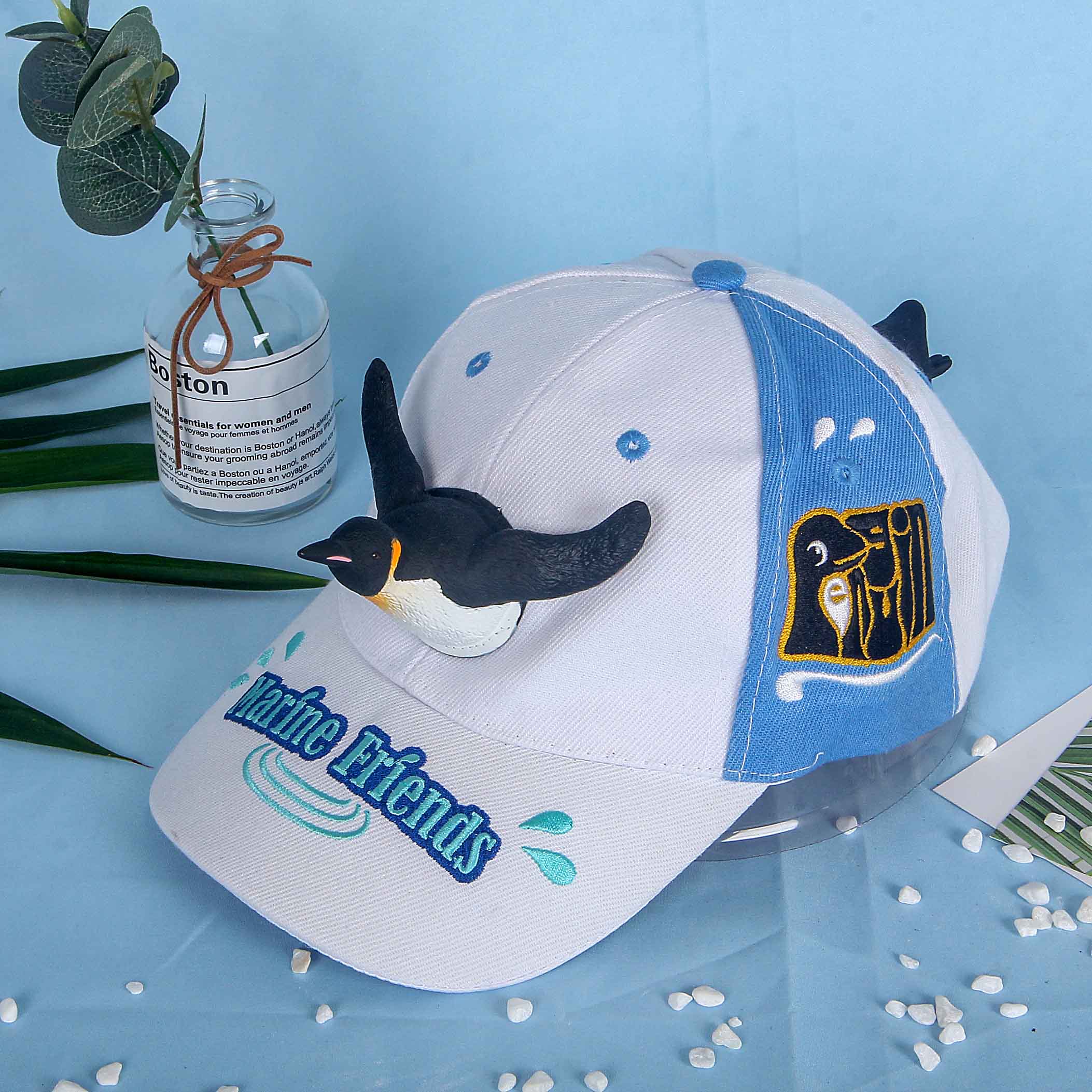 出口日本欧洲广州珠海长隆海洋王国纪念品鸭舌帽创意企鹅公仔帽子