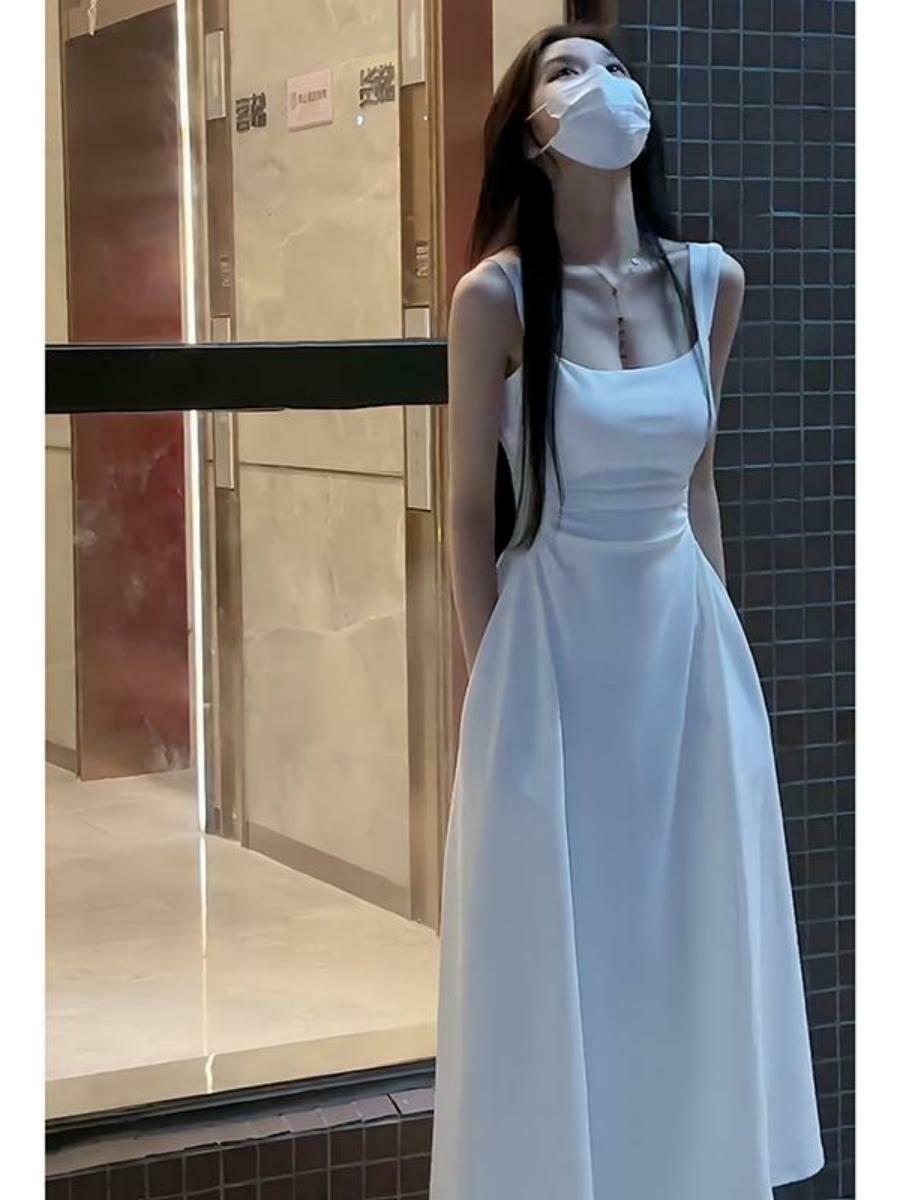 白色吊带连衣裙子女2023夏季新款春秋长袖法式小个子初恋收腰长裙