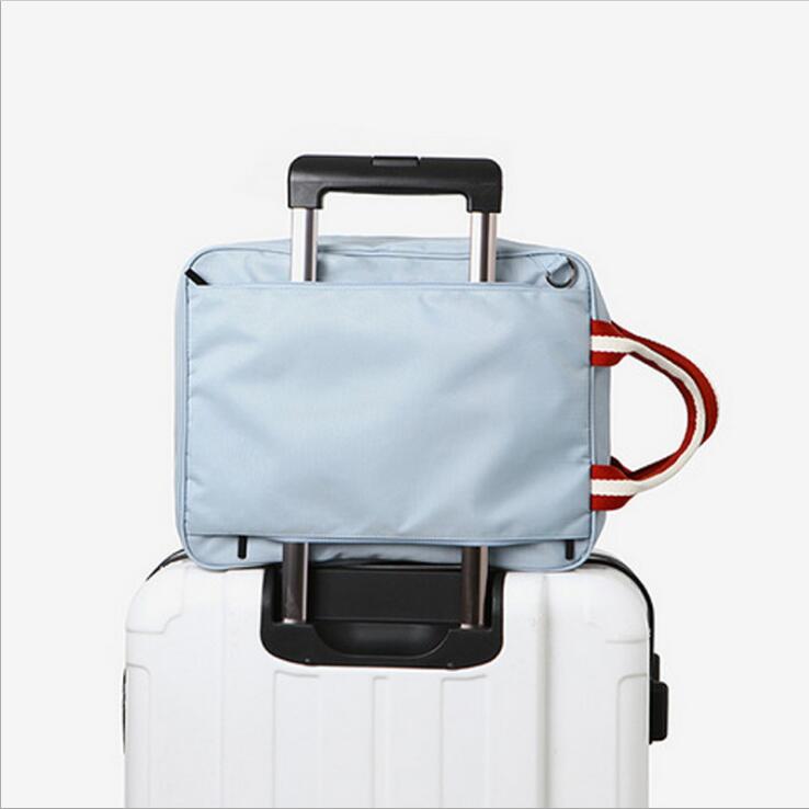 旅游斜挎包多功能单肩旅行包男女手提行李包大容量防水套拉杆箱包